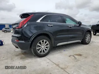 2020 Cadillac XT4 FWD Premium Luxury with VIN 1GYFZCR40LF073517, listed as a Copart auction lot 60121635 with 79,450 mi miles and Salvage title. Bid and sale history available at DreamBid. Image 3.