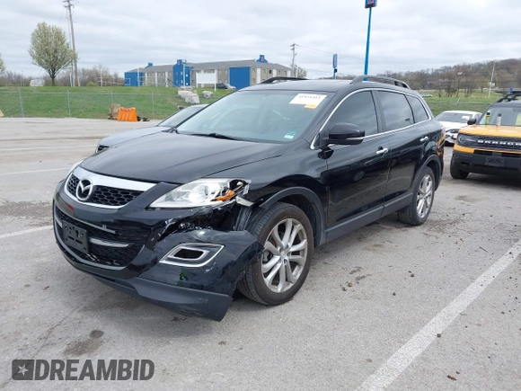 2011 Mazda CX-9 Grand Touring z VIN JM3TB2DAXB0300466, wystawiony jako IAAI lot #41921411 z przebiegiem 196 257 mil mil oraz . Historia ofert i sprzedaży dostępna na DreamBid. Obrazek 18.