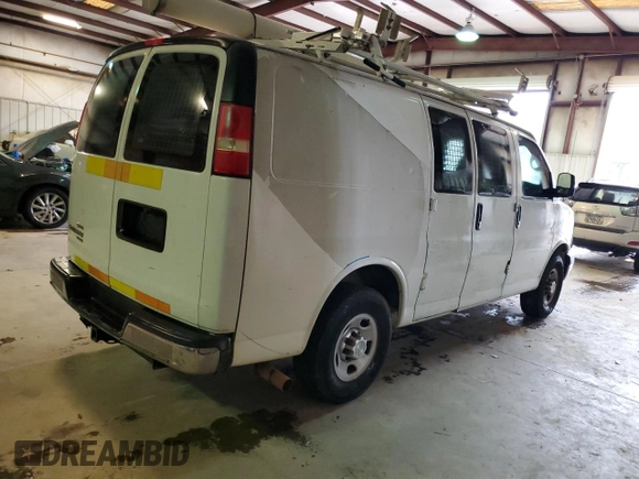 2014 Chevrolet Express Cargo Van with VIN 1GCWGFCB5E1130248, listed as a Copart auction lot 45773125 with 140,728 mi miles and Clean Title. Bid and sale history available at carsss.com. Image 3.