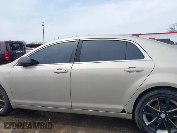 2012 Chevrolet Malibu 1LS with VIN 1G1ZB5E00CF161658, listed as a IAAI auction lot 42027845 with 249,422 mi miles and . Bid and sale history available at DreamBid. Image 15.