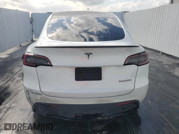 2023 Tesla Model Y Performance with VIN 7SAYGDEF8PF595178, listed as a Copart auction lot 46496995 with 39,057 mi miles and Non Repairable. Bid and sale history available at DreamBid. Image 6.