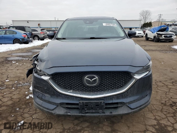 2019 Mazda CX-5 Grand Touring with VIN JM3KFBDM6K0667925, listed as a Copart auction lot 44657565 with 71,359 mi miles and Salvage Title. Bid and sale history available at carsss.com. Image 5.