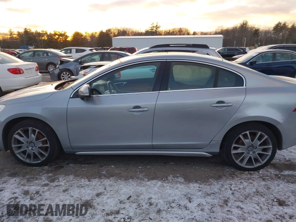 2012 Volvo S60 T6 z VIN YV1902FH3C2040401, wystawiony jako IAAI lot #41230447 z przebiegiem 119 443 mil mil oraz . Historia ofert i sprzedaży dostępna na DreamBid. Obrazek 14.