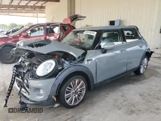 2018 MINI Hardtop 4 Door Cooper с VIN WMWXU1C55J2F79623, выставлен на аукционе Copart как лот 60515015 с пробегом Не указан миль и Списание • Salvage title. История ставок и продаж доступна на DreamBid. Изображение 1.