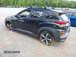 2020 Hyundai Kona Limited z VIN KM8K33A52LU591422, wystawiony jako IAAI lot #42324828 z przebiegiem 59 957 mil mil oraz . Historia ofert i sprzedaży dostępna na DreamBid. Obrazek 3.