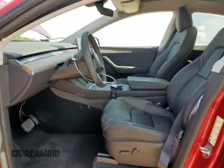2024 Tesla Model Y Long Range with VIN 7SAYGDEE5RA235910, listed as a Copart auction lot 60988605 with 23,882 mi miles and Salvage title. Bid and sale history available at DreamBid. Image 7.