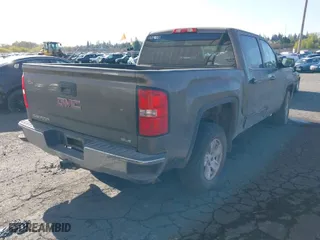 2015 GMC Sierra 1500 SLE with VIN 3GTU2UEC2FG309656, listed as a IAAI auction lot 41922877 with 194,339 mi miles. Bid and sale history available at carsss.com. Image 4.