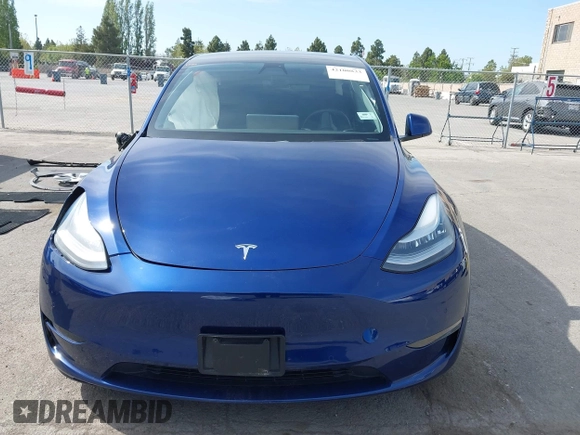 2020 Tesla Model Y Long Range with VIN 5YJYGDEE1LF006227, listed as a IAAI auction lot 42100833 with 49,761 mi miles and . Bid and sale history available at DreamBid. Image 13.