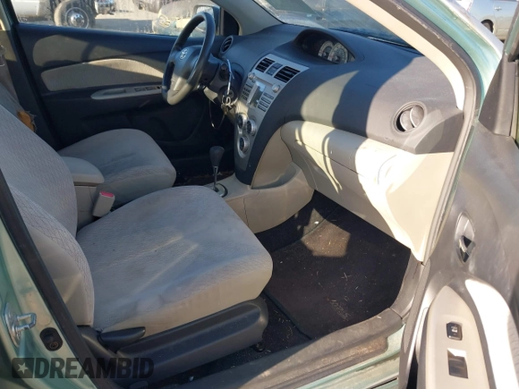 2007 Toyota Yaris with VIN JTDBT923371029654, listed as a IAAI auction lot 42142361 with 296,107 mi miles. Bid and sale history available at carsss.com. Image 5.