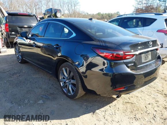 2018 Mazda 6 Grand Touring with VIN JM1GL1TY0J1319083, listed as a IAAI auction lot 40852818 with 57,408 mi miles and . Bid and sale history available at DreamBid. Image 3.