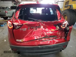 2016 Mazda CX-5 Grand Touring with VIN JM3KE4DY1G0669316, listed as a Copart auction lot 79961554 with 117,454 mi miles and Salvage Title. Bid and sale history available at carsss.com. Image 6.