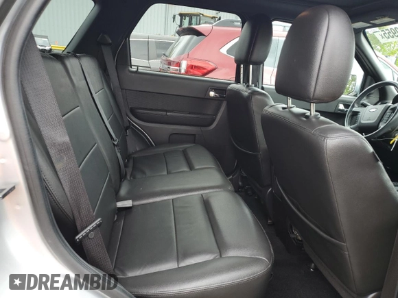 2010 Ford Escape Limited with VIN 1FMCU0EG9AKA54244, listed as a Copart auction lot 56930955 with 88,496 mi miles and Salvage title. Bid and sale history available at DreamBid. Image 11.