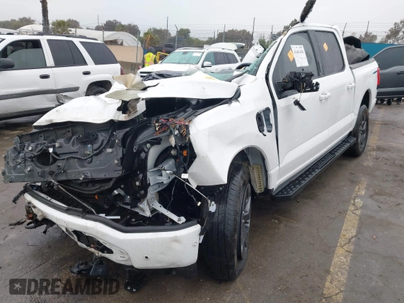2023 Ford F-150 Lightning Pro with VIN 1FT6W1EV8PWG05765, listed as a IAAI auction lot 41461450 with Not Provided miles and . Bid and sale history available at DreamBid. Image 2.