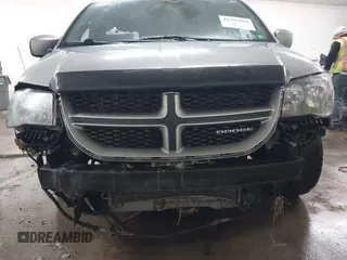 2015 Dodge Grand Caravan SE with VIN 2C4RDGBG9FR703691, listed as a IAAI auction lot 41395564 with 170,735 mi miles and . Bid and sale history available at DreamBid. Image 6.