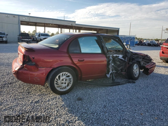 1999 Saturn SL z VIN 1G8ZK5278XZ173810, wystawiony jako Copart lot #42571425 z przebiegiem 114 580 mil mil oraz Szkoda całkowita • Salvage title. Historia ofert i sprzedaży dostępna na DreamBid. Obrazek 3.