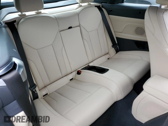 2023 BMW 4 Series 430i xDrive with VIN WBA43AT09PCM21604, listed as a Copart auction lot 49326175 with 15,305 mi miles and Salvage Title. Bid and sale history available at DreamBid. Image 10.