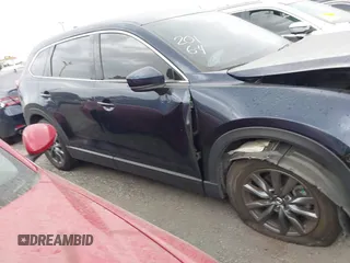2021 Mazda CX-9 Touring with VIN JM3TCACY9M0526880, listed as a IAAI auction lot 42310923 with 25,991 mi miles and . Bid and sale history available at DreamBid. Image 14.