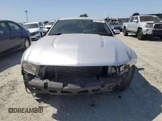 2012 Ford Mustang Premium z VIN 1ZVBP8AM7C5237576, wystawiony jako Copart lot #60374995 z przebiegiem 123 061 mil mil oraz Szkoda całkowita • Salvage title. Historia ofert i sprzedaży dostępna na DreamBid. Obrazek 5.