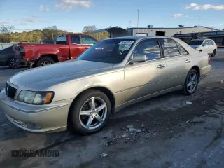 1999 Infiniti Q45 z VIN JNKBY31A1XM605401, wystawiony jako Copart lot #76582304 z przebiegiem 115 791 mil mil oraz Tytuł czysty. Historia ofert i sprzedaży dostępna na DreamBid. Obrazek 1.