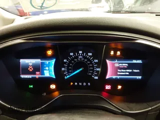 2014 Ford Fusion Titanium with VIN 3FA6P0K97ER324027, listed as a IAAI auction lot 41327141 with 161,045 mi miles and . Bid and sale history available at DreamBid. Image 7.