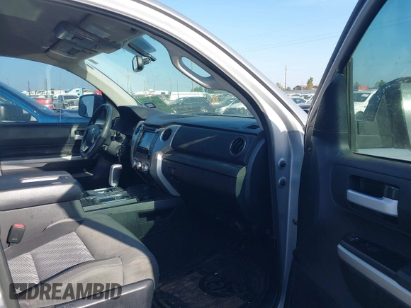 2014 Toyota Tundra SR with VIN 5TFRM5F13EX078411, listed as a IAAI auction lot 42702477 with 123,336 mi miles and . Bid and sale history available at DreamBid. Image 5.