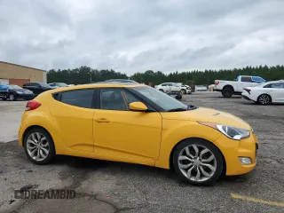 2012 Hyundai Veloster w/Black Int with VIN KMHTC6AD9CU027490, listed as a Copart auction lot 60211855 with 113,836 mi miles and Salvage title. Bid and sale history available at DreamBid. Image 4.