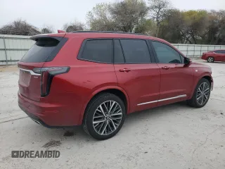 2023 Cadillac XT6 AWD Sport z VIN 1GYKPGRS5PZ221207, wystawiony jako Copart lot #41876425 z przebiegiem 23 193 mil mil oraz Szkody całkowita. Historia ofert i sprzedaży dostępna na DreamBid. Obrazek 3.