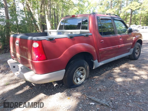 2001 Ford Explorer Sport Trac z VIN 1FMZU67EX1UA94698, wystawiony jako IAAI lot #42764474 z przebiegiem 299 653 mil mil oraz . Historia ofert i sprzedaży dostępna na DreamBid. Obrazek 4.