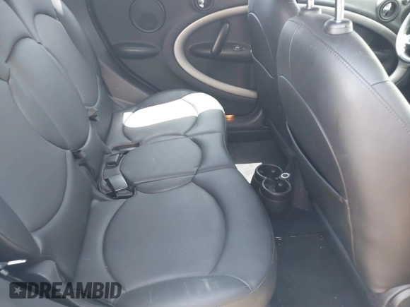 2014 MINI Countryman with VIN WMWZB3C52EWR40215, listed as a IAAI auction lot 42687571 with 106,338 mi miles and . Bid and sale history available at DreamBid. Image 8.