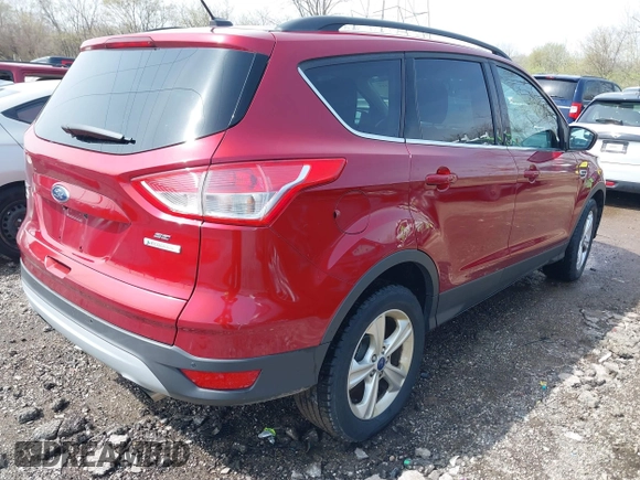 2014 Ford Escape SE with VIN 1FMCU0GX8EUA49818, listed as a IAAI auction lot 41903815 with 100,235 mi miles. Bid and sale history available at carsss.com. Image 4.