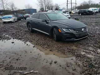 2020 Volkswagen Arteon SEL R-Line z VIN WVWSR7AN1LE014417, wystawiony jako Copart lot #82115513 z przebiegiem 22 494 mil mil oraz . Historia ofert i sprzedaży dostępna na DreamBid. Obrazek 11.