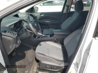 2017 Ford Escape SE z VIN 1FMCU0GD9HUE38848, wystawiony jako Copart lot #56859745 z przebiegiem 69 404 mil mil oraz Szkoda całkowita • Salvage title. Historia ofert i sprzedaży dostępna na DreamBid. Obrazek 7.