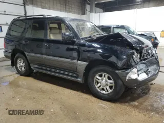2002 Lexus LX 470 z VIN JTJHT00W023515545, wystawiony jako Copart lot #79218054 z przebiegiem 310 334 mil mil oraz Szkoda całkowita • Salvage title. Historia ofert i sprzedaży dostępna na DreamBid. Obrazek 4.
