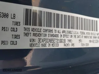 2014 Dodge Journey SE with VIN 3C4PDCAB5ET216618, listed as a IAAI auction lot 41973946 with 151,693 mi miles. Bid and sale history available at carsss.com. Image 9.