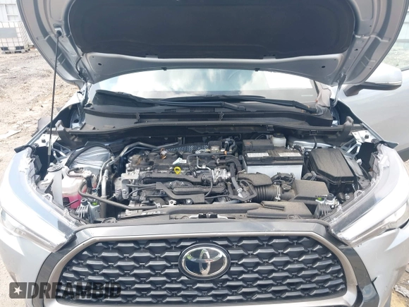 2023 Toyota Corolla Cross XLE with VIN 7MUDAAAG0PV057750, listed as a IAAI auction lot 42302284 with 31,404 mi miles and . Bid and sale history available at DreamBid. Image 10.