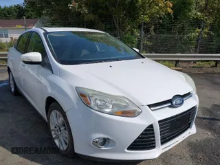 2012 Ford Focus SEL with VIN 1FAHP3H20CL470527, listed as a IAAI auction lot 42028826 with 165,197 mi miles. Bid and sale history available at carsss.com. Image 1.