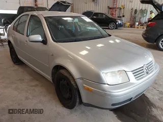 2002 Volkswagen Jetta GLS z VIN 3VWSB69M62M158593, wystawiony jako IAAI lot #42428132 z przebiegiem 236 719 mil mil oraz . Historia ofert i sprzedaży dostępna na DreamBid. Obrazek 1.