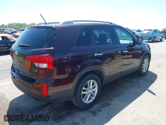 2015 Kia Sorento LX with VIN 5XYKTDA70FG604220, listed as a IAAI auction lot 42060598 with 128,180 mi miles and . Bid and sale history available at DreamBid. Image 4.
