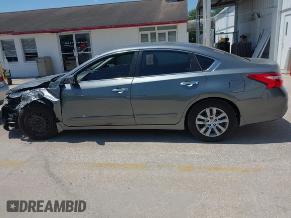 2016 Nissan Altima S z VIN 1N4AL3AP6GC228463, wystawiony jako IAAI lot #42032010 z przebiegiem 159 999 mil mil oraz . Historia ofert i sprzedaży dostępna na DreamBid. Obrazek 15.