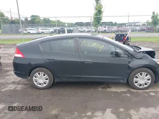 2010 Honda Insight LX z VIN JHMZE2H59AS037444, wystawiony jako IAAI lot #42358409 z przebiegiem 201 680 mil mil oraz . Historia ofert i sprzedaży dostępna na DreamBid. Obrazek 13.