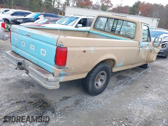 1987 Ford F-150 with VIN 1FTDF15Y2HNB10843, listed as a IAAI auction lot 41017280 with 25,203 mi miles. Bid and sale history available at carsss.com. Image 4.