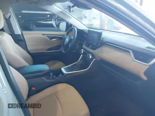 2020 Toyota RAV4 Hybrid XLE with VIN 2T3RWRFV0LW082793, listed as a IAAI auction lot 41674569 with 50,224 mi miles and . Bid and sale history available at DreamBid. Image 5.