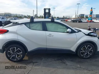 2019 Toyota C-HR XLE with VIN JTNKHMBX4K1040772, listed as a IAAI auction lot 41812031 with 79,729 mi miles. Bid and sale history available at carsss.com. Image 14.