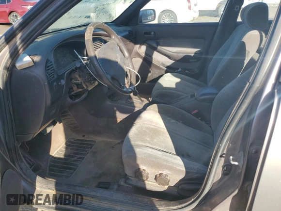 1992 Toyota Camry LE with VIN 4T1SK12E3NU104088, listed as a Copart auction lot 47496735 with 174,957 mi miles and Salvage Title. Bid and sale history available at carsss.com. Image 7.