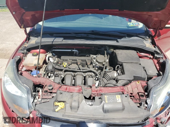 2014 Ford Focus Titanium z VIN 1FADP3N29EL409568, wystawiony jako Copart lot #62295345 z przebiegiem 53 401 mil mil oraz Szkoda całkowita • Salvage title. Historia ofert i sprzedaży dostępna na DreamBid. Obrazek 11.