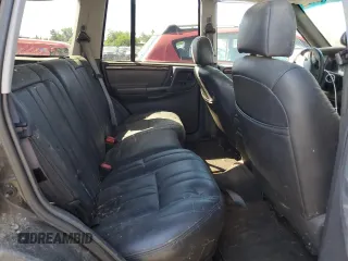 1998 Jeep Grand Cherokee Laredo with VIN 1J4GZ58Y4WC109610, listed as a Copart auction lot 58705124 with 247,990 mi miles and Salvage Title. Bid and sale history available at carsss.com. Image 10.