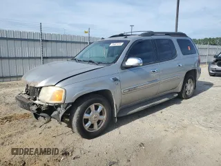 2004 GMC Envoy SLE with VIN 1GKES16P746127734, listed as a Copart auction lot 70487474 with 462,491 mi miles and Salvage Title. Bid and sale history available at DreamBid. Image 1.