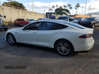 2013 Tesla Model S with VIN 5YJSA1AC8DFP10890, listed as a Copart auction lot 60735174 with 51,847 mi miles and Clean Title. Bid and sale history available at DreamBid. Image 2.