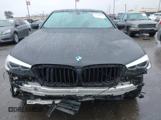 2019 BMW 5 Series 530e iPerformance with VIN WBAJA9C53KB399794, listed as a IAAI auction lot 41561874 with Not Provided miles. Bid and sale history available at carsss.com. Image 12.