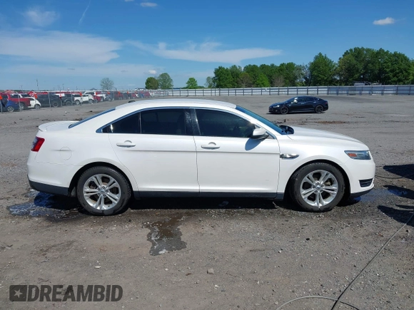 2013 Ford Taurus SEL with VIN 1FAHP2E80DG179961, listed as a IAAI auction lot 42088532 with 131,196 mi miles and . Bid and sale history available at carsss.com. Image 14.